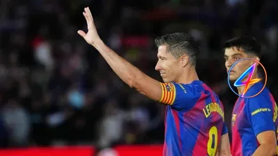 Raphinha Hands Captain's Armband to Lewandowski as He Departs Barcelona